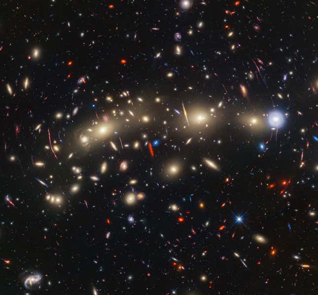 The full image of the galaxies, complete with smears of gravitational lensing.
